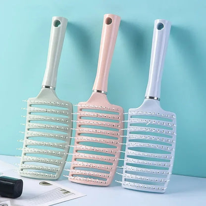 Ventilated paddle hair brush