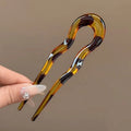 Curved hair bun pin
