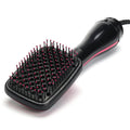 Heated straightening brush