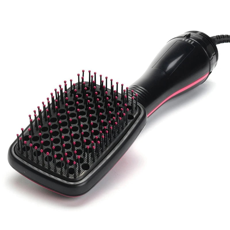 Heated straightening brush