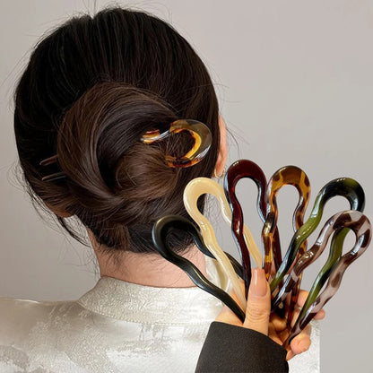 Curved hair bun pin