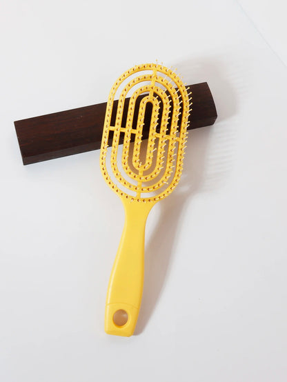 Ventilated oval paddle hair brush