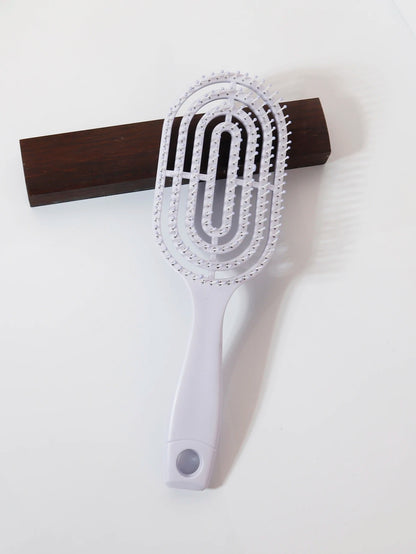Ventilated oval paddle hair brush